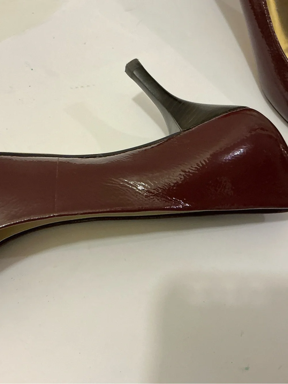 Michael Kors Burgundy Patent Leather Mid-Heel Pumps with Gold MK Emblem